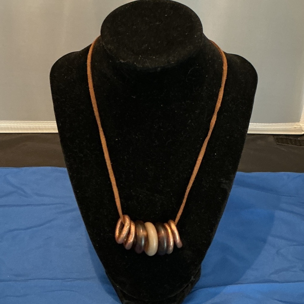 Elegant Brown Necklace with Metallic Accents
